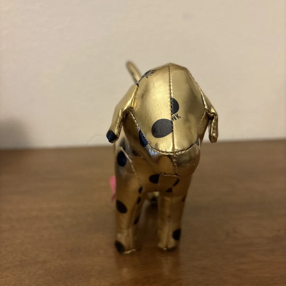2012 Victoria Secret VS‎ PINK plush dog. Shiny gold with black polka dots.